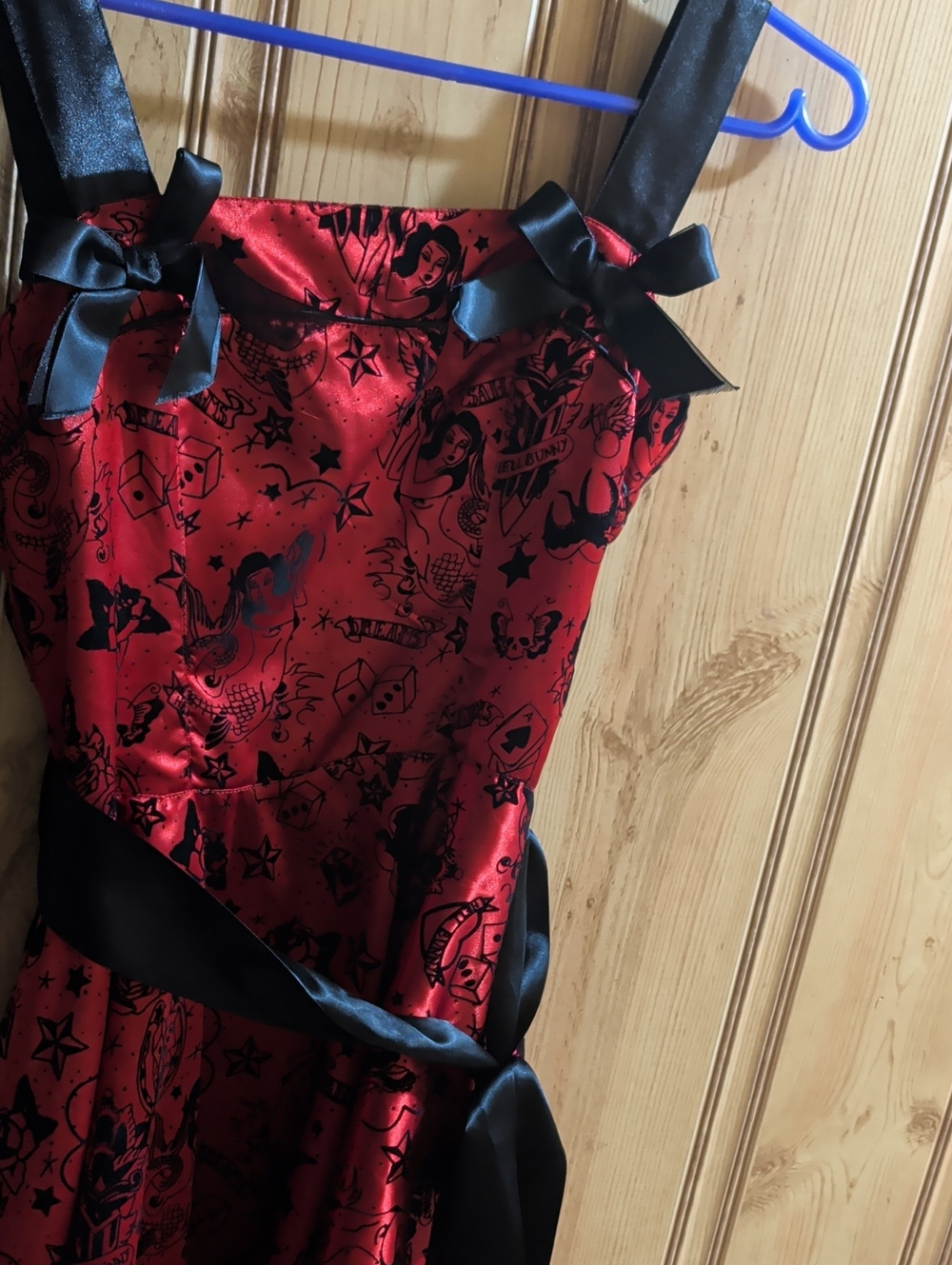 Hell Bunny Red Satin High-Low Dress with Black Trim and Bow Accents